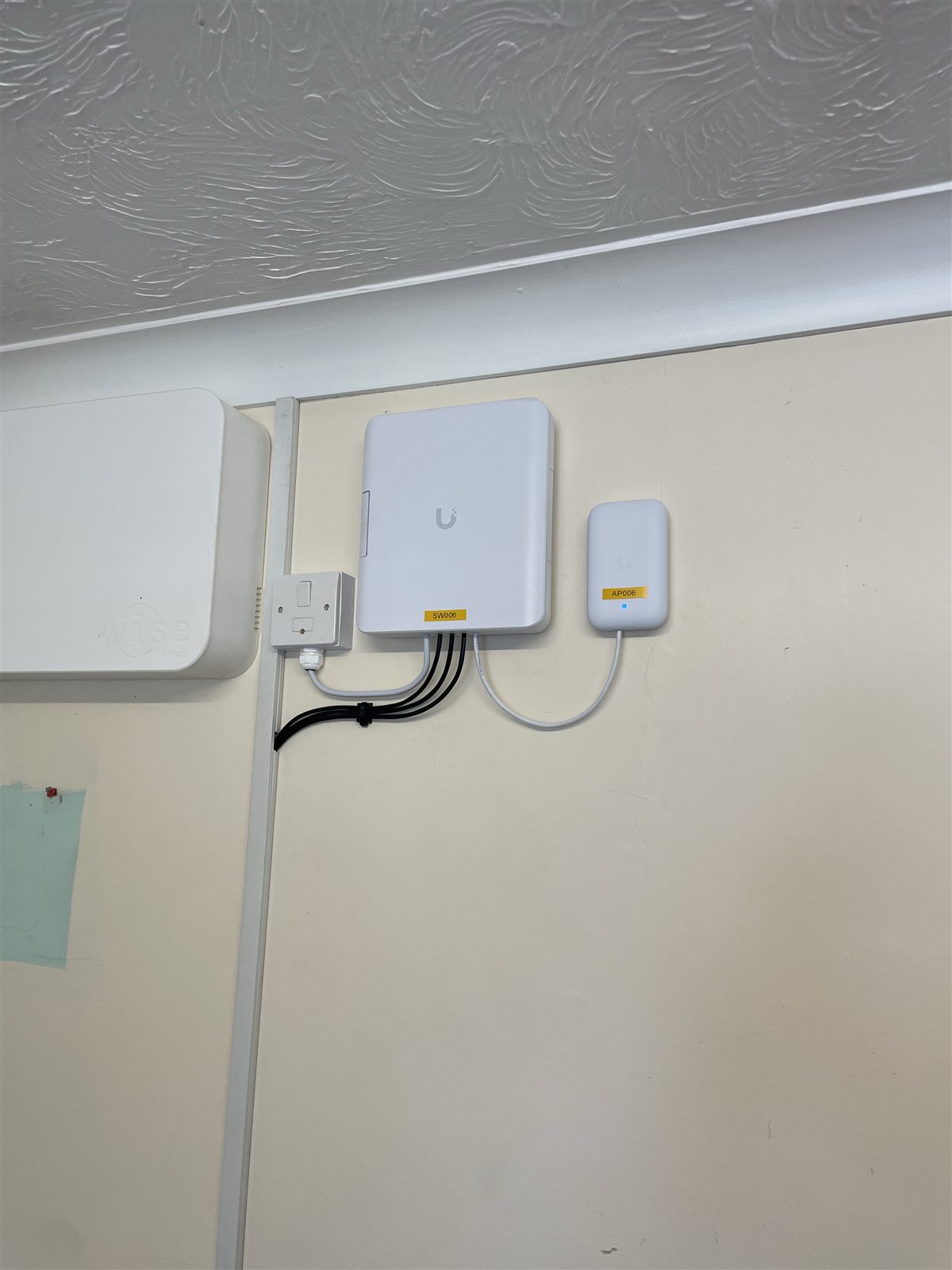 Wall-mounted network equipment inside a holiday home