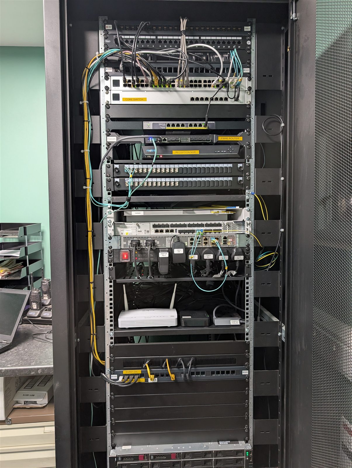 Main network rack with switches and cabling